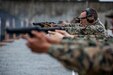 U.S. Marine Corps Gunnery Sgt. Nathaniel Schoenhoefer, a data systems chief with Combat Logistics Regiment 37, takes aim during the 2020 Far East Intramural Matches on Camp Hansen, Okinawa, Japan, Dec. 10. The competition is held annually to improve Marines� marksmanship, combat readiness, and proficiency with both a rifle and pistol. (U.S. Marine Corps photo by Lance Cpl. Zachary Larsen)